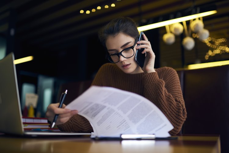 female accountant talking on phone