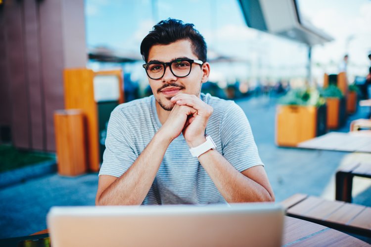 young male adult freelancer smiling