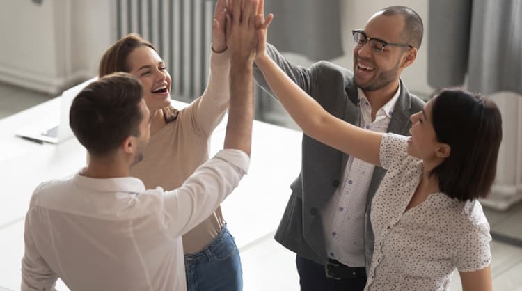 enthusiastic team high-fiving