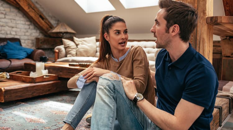 couple sitting down and having a discussion