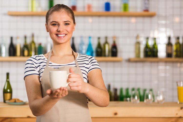 young woman offering coffee