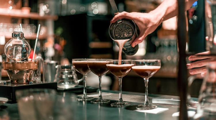 bartender pouring drinks