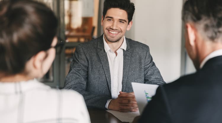 man smiling during job interview