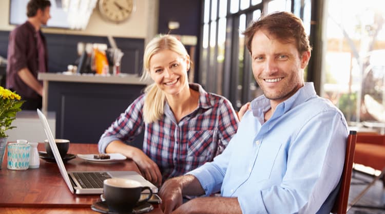 smiling middle-aged man and woman