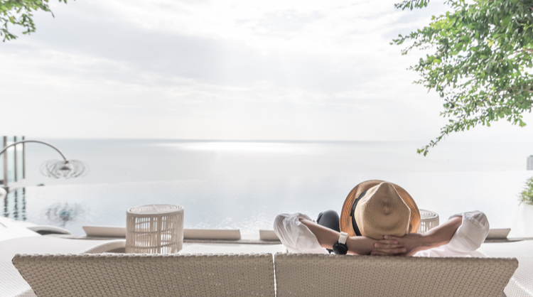 business man taking a break at beach