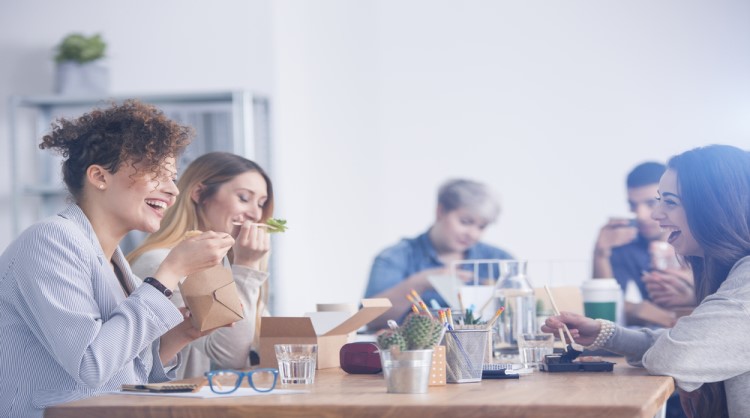 women employees having lunch together