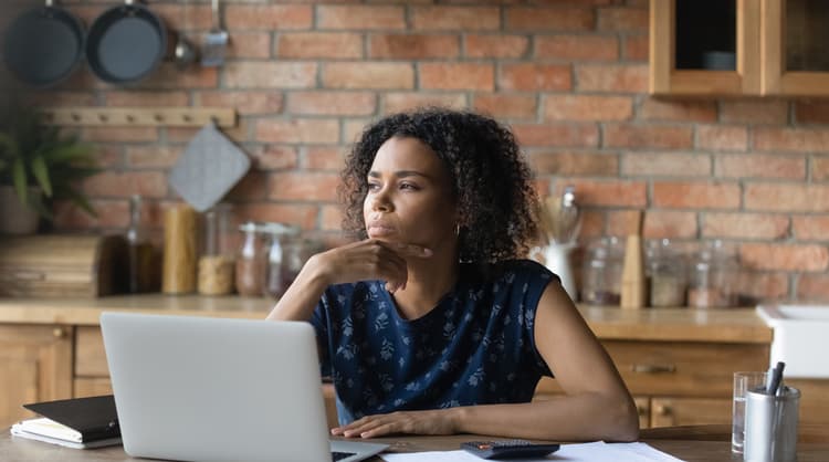 young woman deep in thought