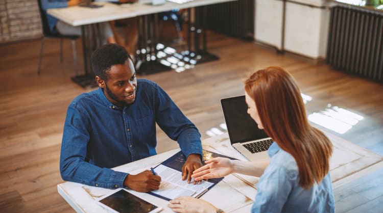 man talking to manager during job interview