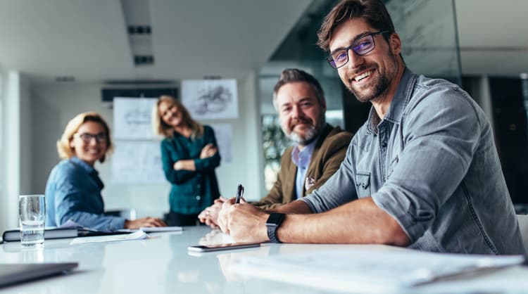 team of business professionals smiling