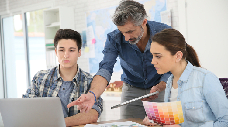 interns learning from professional