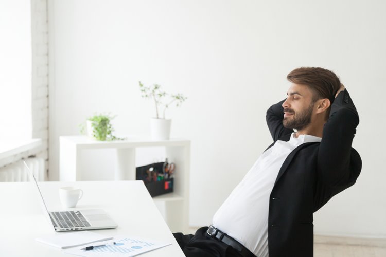 relaxed man taking a break from work