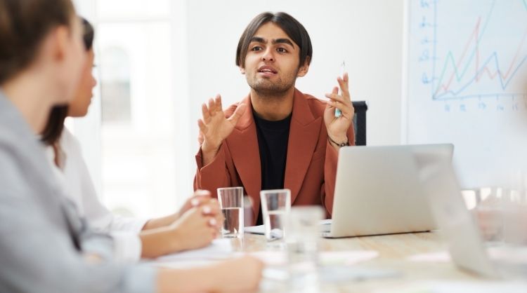 person doing a presentation to executive team