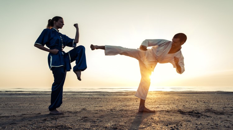 couple training in martial arts