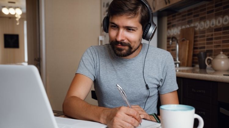 man studying online