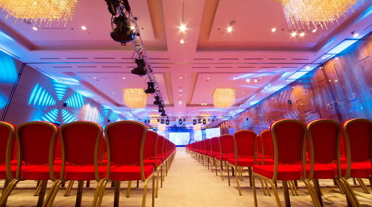 red chairs in large hall