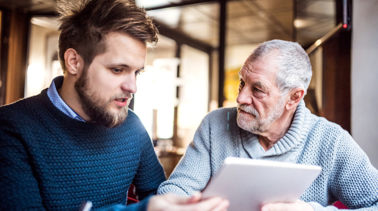 young man talking with his father