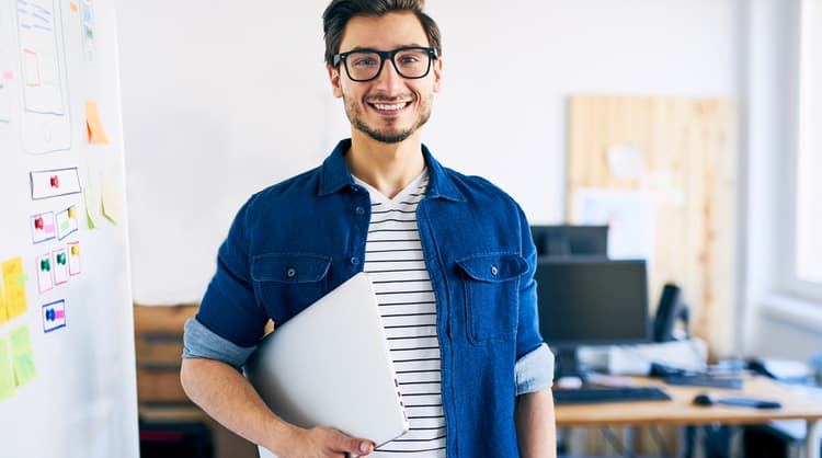 male web designer smiling