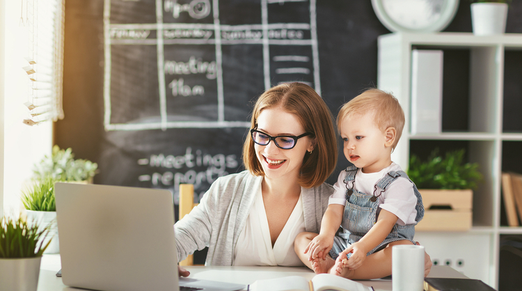 mother working from home with child