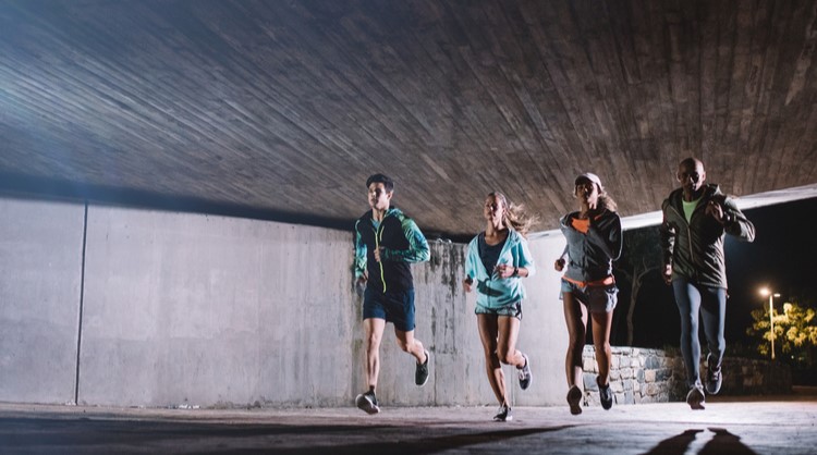 group of friends jogging together