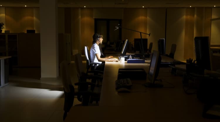 young woman working at the office alone