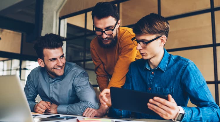 Happy employees in discussion