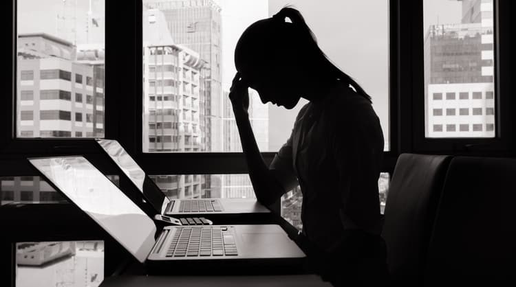 woman's silhouette looking stressed out