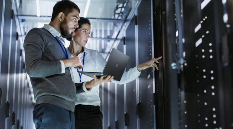 male and woman IT specialist busy at work