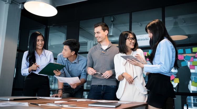 young employees looking happy