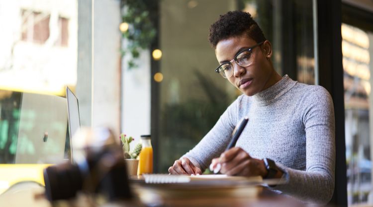 african american woman writing