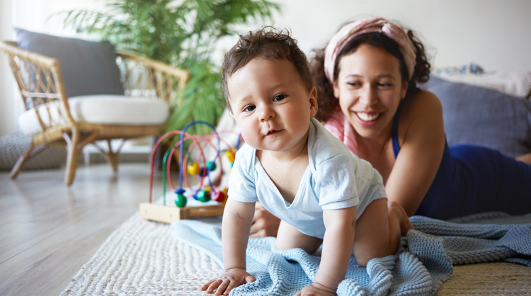 young mother playing with son