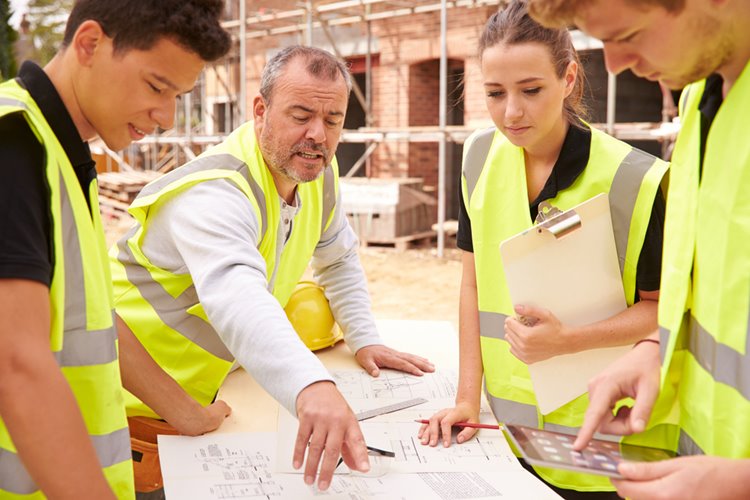 young people working as apprentices in construction industry