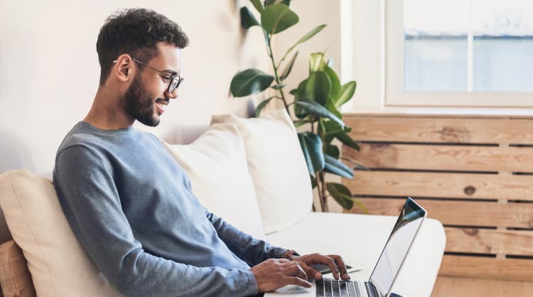 man studying online