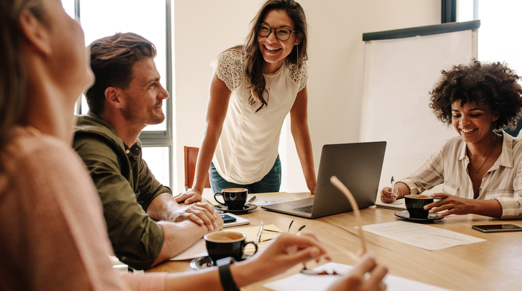 multicultural people in work meeting smiling