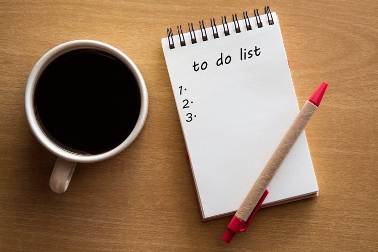 to-do list with black coffee