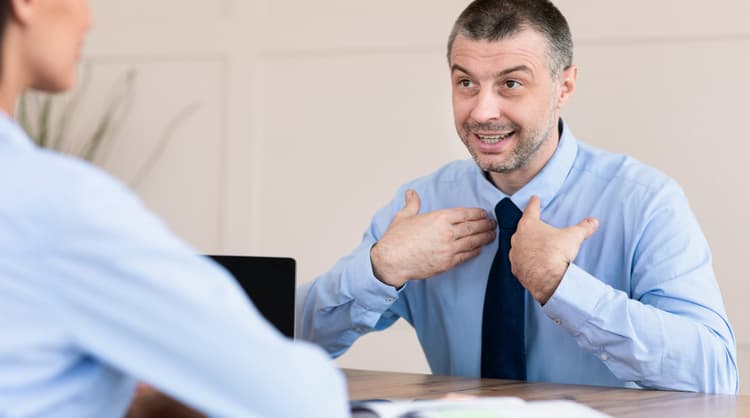 mature man undertaking a job interview