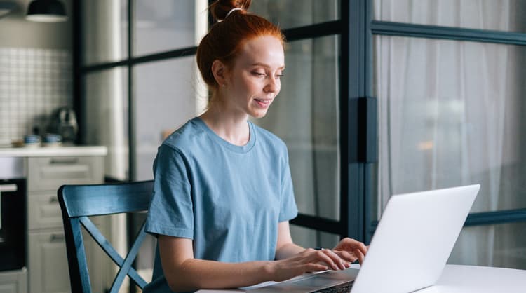 woman working from home online learning