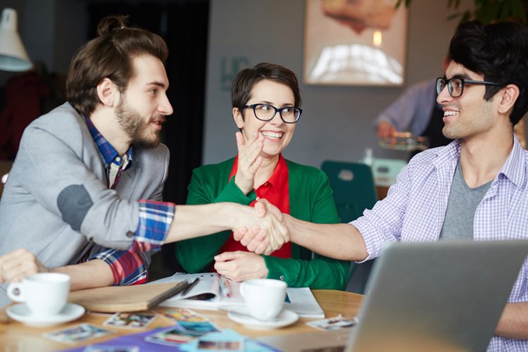 colleagues shaking hands