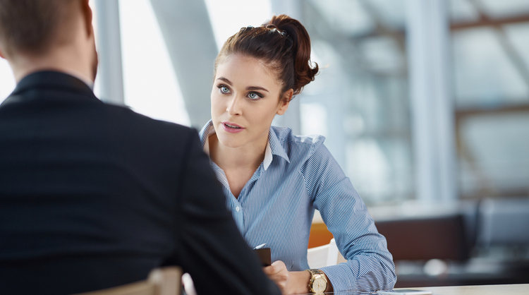 woman recruiter asking questions to job applicant