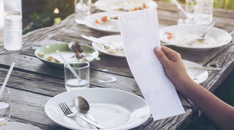 woman checking receipt