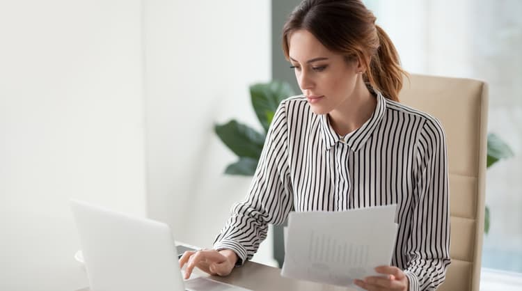 office woman working on laptop