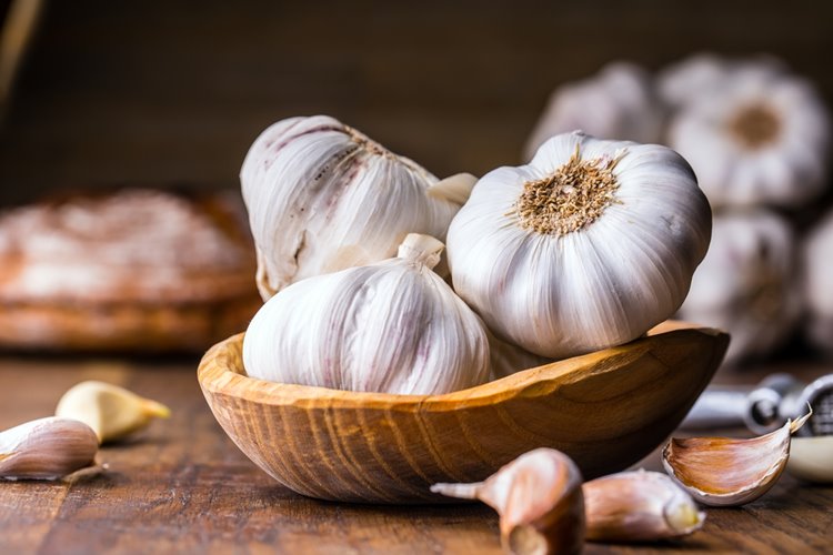 garlic in a wooden bowl