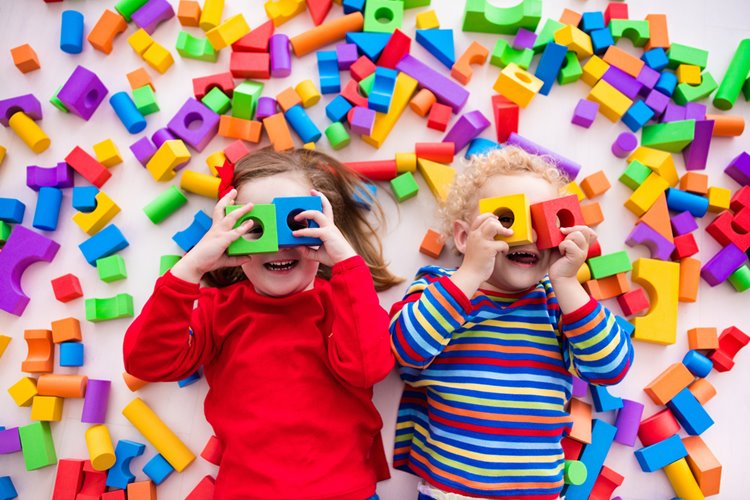 preschool children playing with blocks