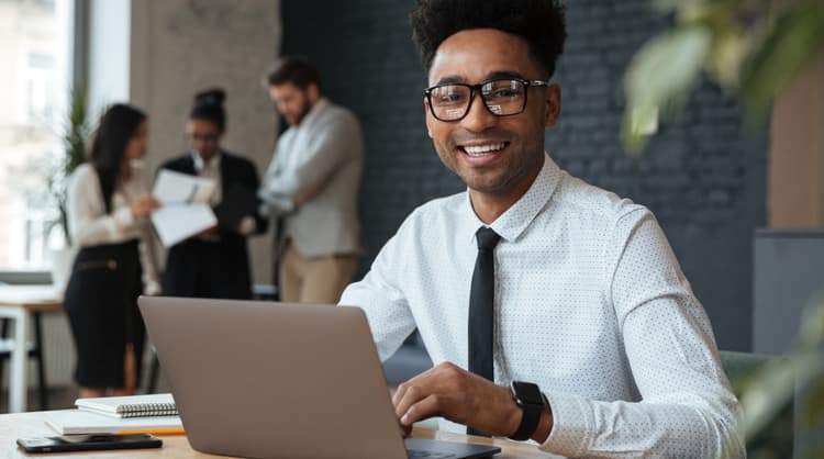 smiling man looking at camera